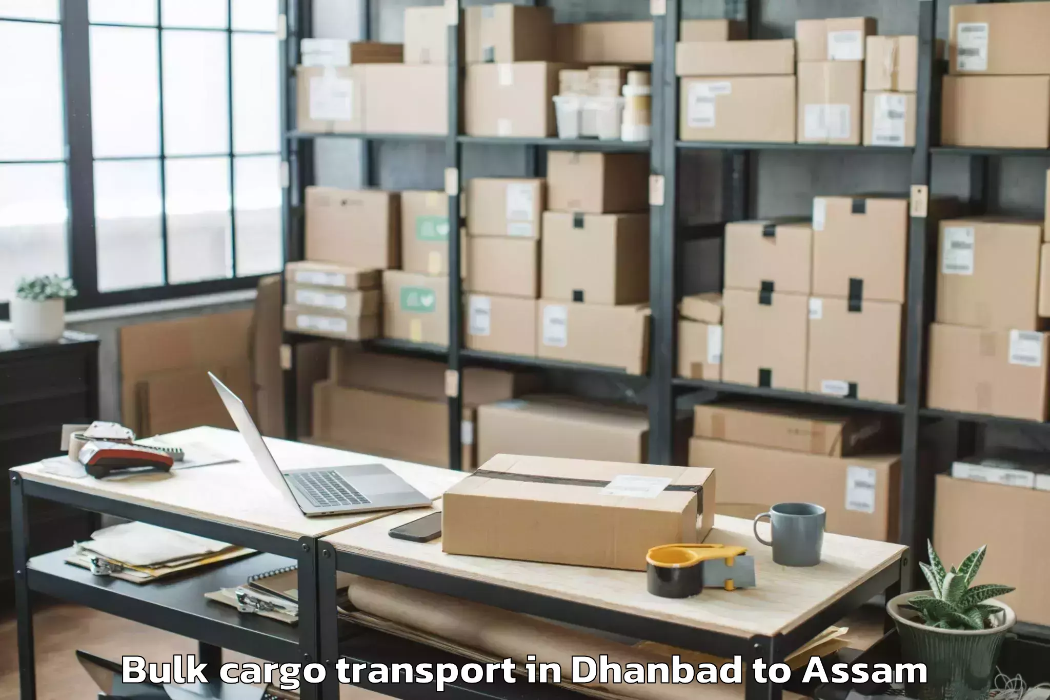 Easy Dhanbad to Borjhar Airport Gau Bulk Cargo Transport Booking